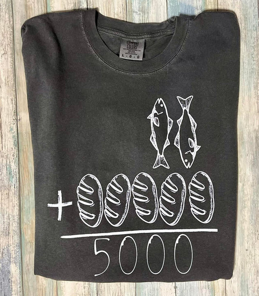 Pepper color long sleeve crew neck t-shirt with white drawings of two fish and five loaves, and the text 'JESUS FED 5000' below them.
