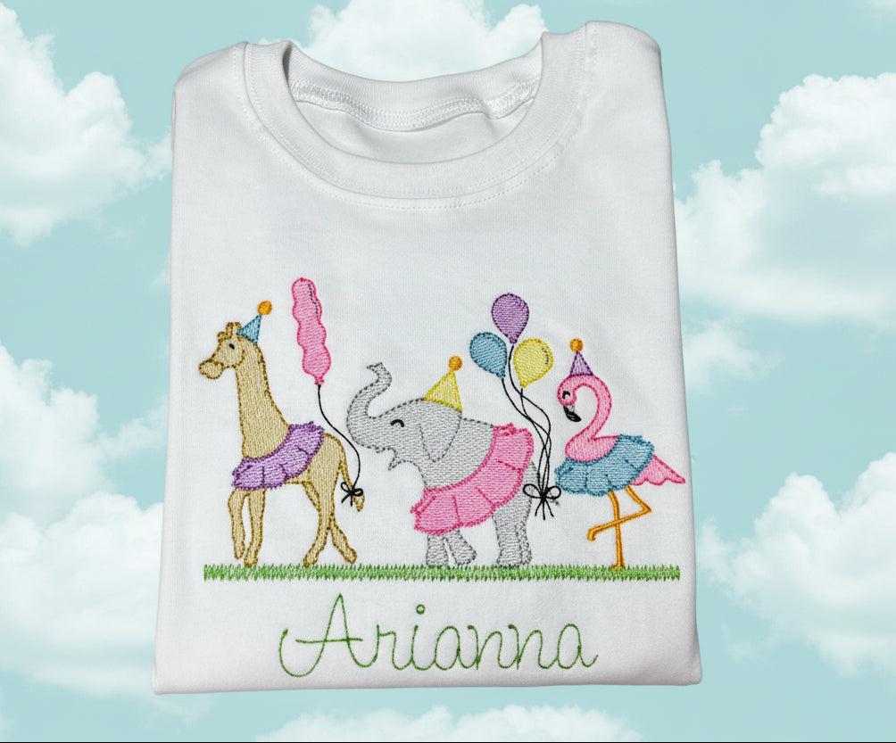 Embroidered design of a giraffe, elephant, and flamingo with balloons and name Arianna