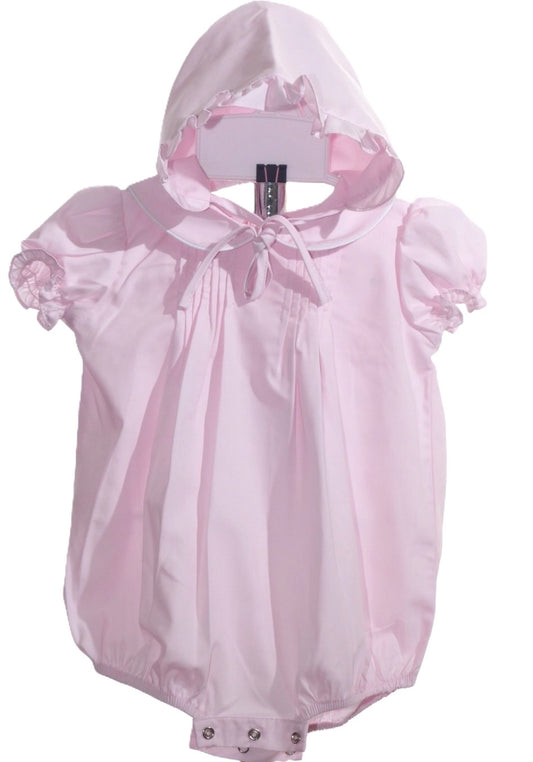 light pink baby bubble with peter pan collar and matching bonnet on white background  bubble has ruffle sleeves and snaps at the bottom